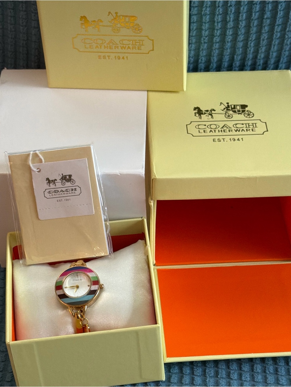 Coach Gold-Tone Bangle Watch with Multicolor Enamel Stripes